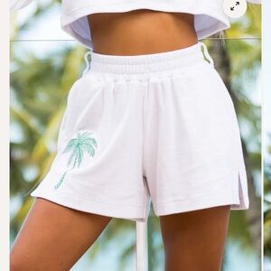 Kenny Flowers poolside Terry Cabana shorts